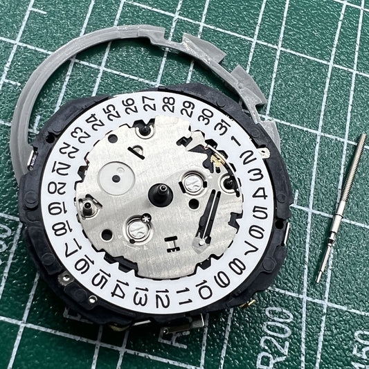 Hattori Epson TMI YM92A quartz watch movement for precise timekeeping, made in Japan.