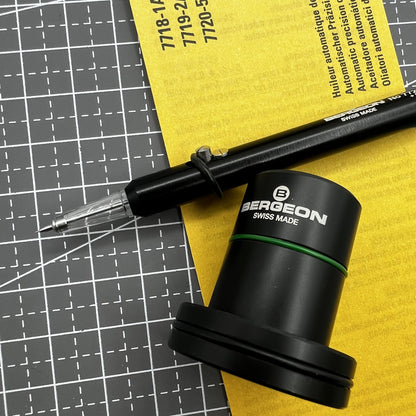 Swiss Tool Bergeon 7720-5 automatic watch oiler for precise clock maintenance and repair.