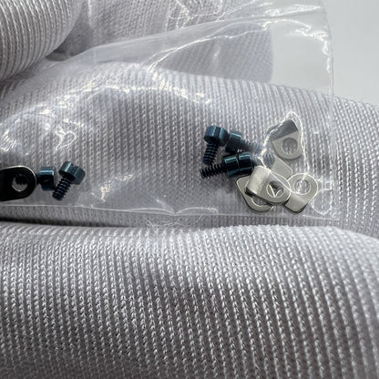 Watch part casing clamp with screws for Seagull ST3600 movement repair and assembly.