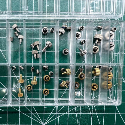 Stainless steel watch crown with silver and gold finish, screw-on tube, gasket by Durable for watch repair.