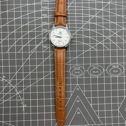 Shanghai Factory 32mm manual mechanical watch with silver case and classic silver hour markers.