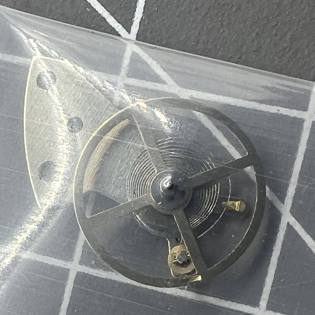 Complete balance wheel with splint for Mingzhu 2813 8205 watch movement, precision repair part by Mingzhu.