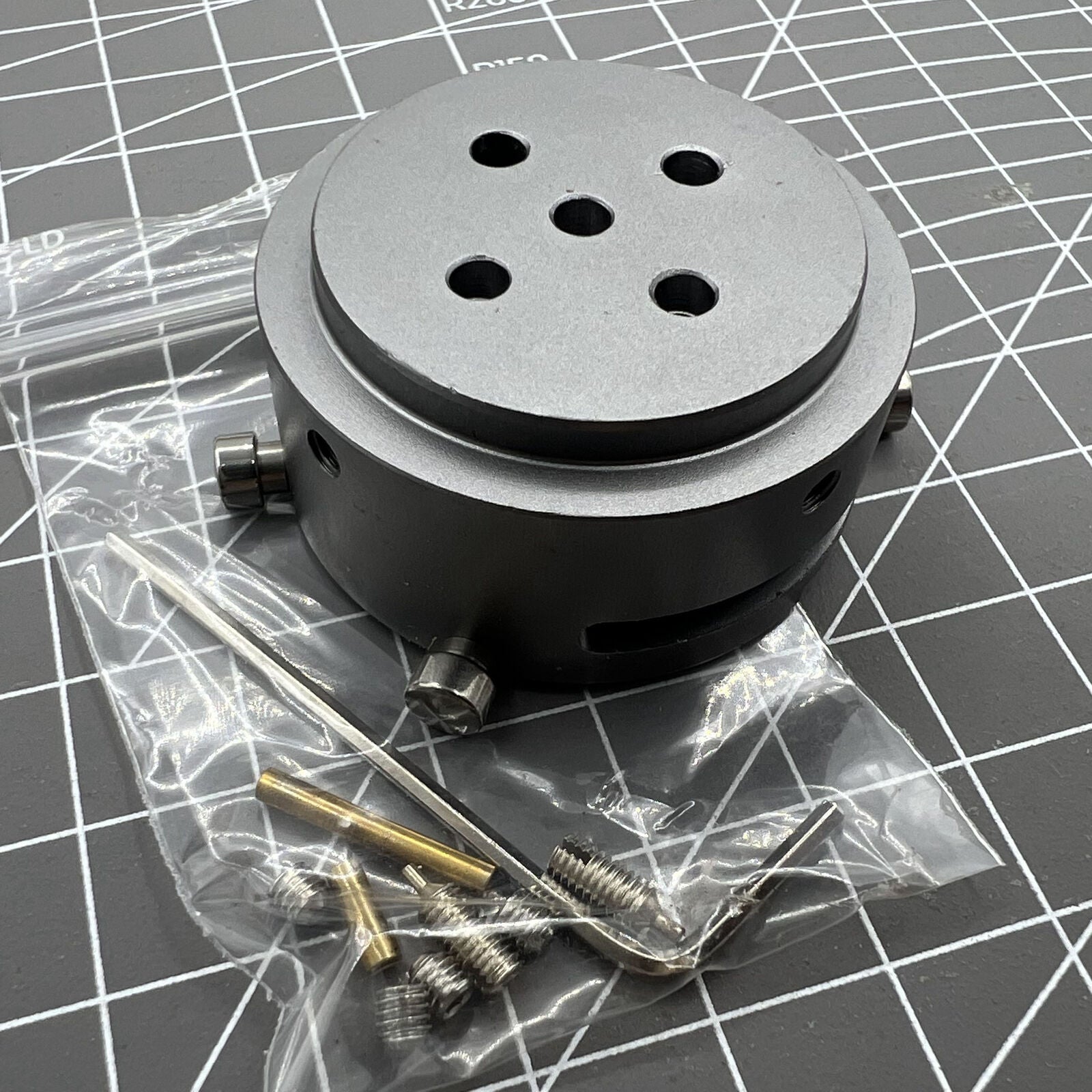 7750-53 standard watch movement holder securely fitting ETA 7750 for precise repairs and assembly.