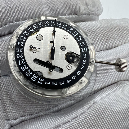 Swiss Made ETA C01.211 chronograph watch movement with 1853 black dial for precision timekeeping.
