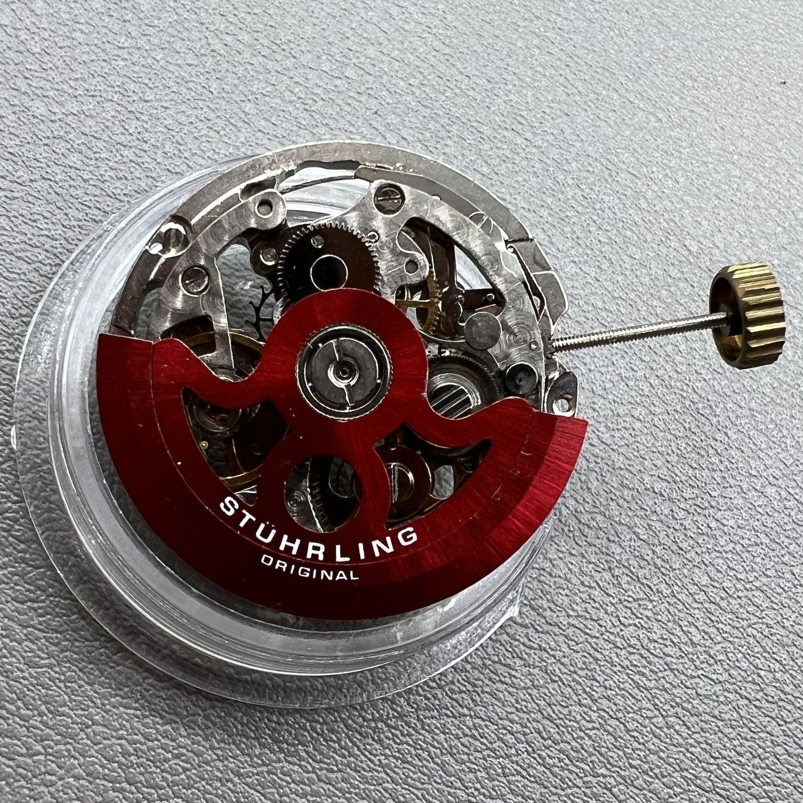 Hollow Hangzhou 2189 watch accessory featuring red rotor and automatic mechanical movement for precision timekeeping.