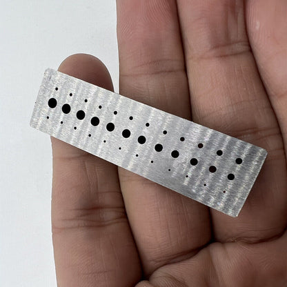 Bergeon 1902 steel staking block for precise riveting in watch repair, durable tool for watchmakers.