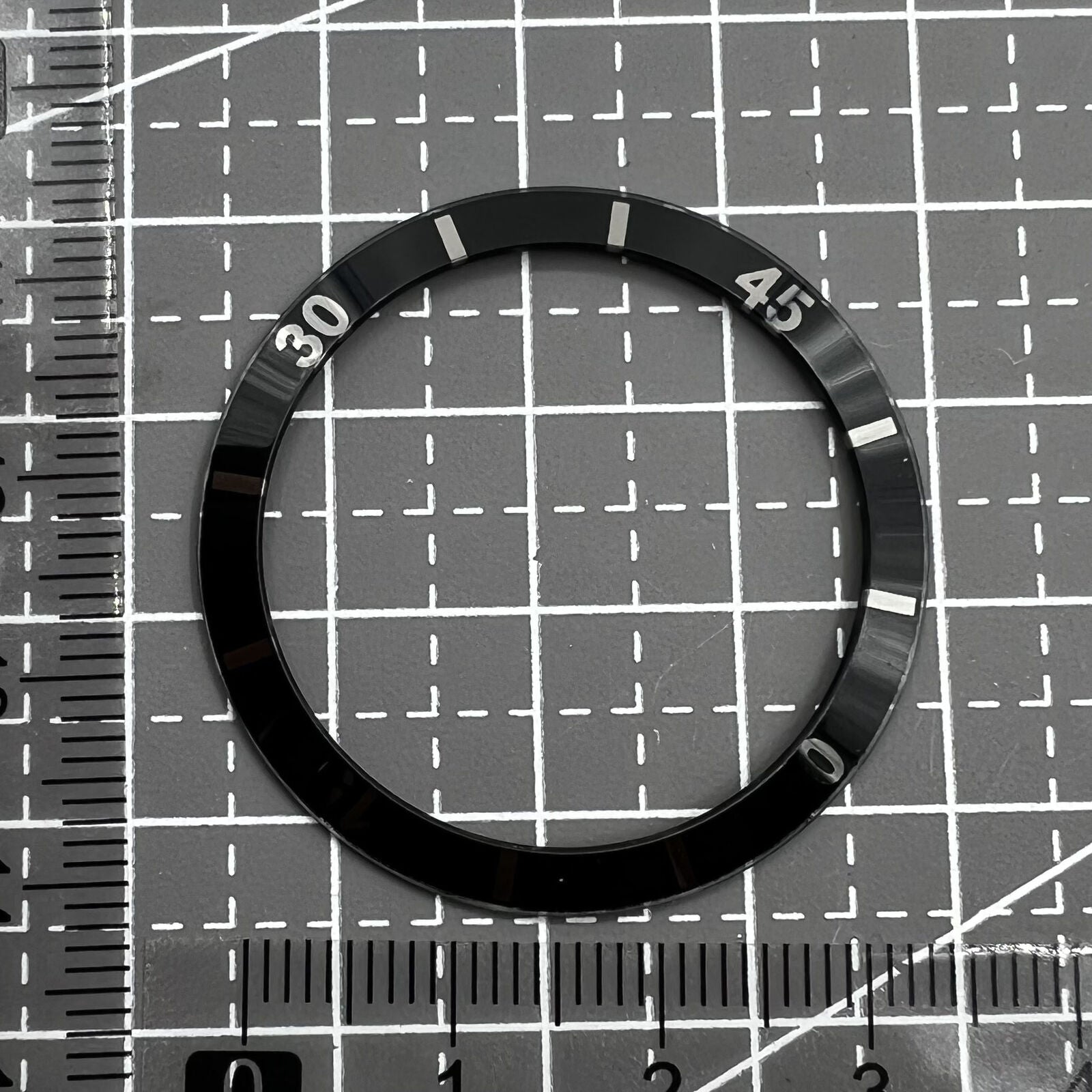 36mm black ceramic bezel insert with numerals, perfect for men and women?s watches.