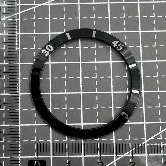 36mm black ceramic bezel insert with numerals, perfect for men and women?s watches.