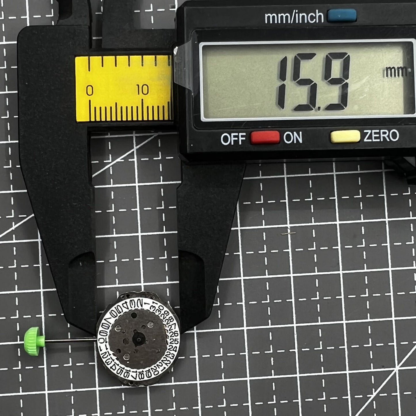 Miyota 4T13 quartz watch movement with three hands and date window at 3 o'clock, precise timekeeping accessory.