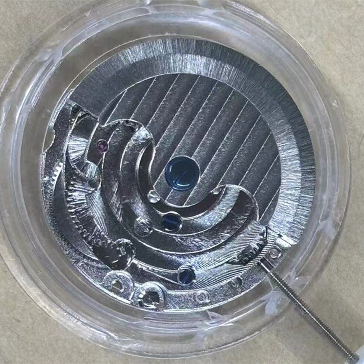 China Made Lady watch with 3 hands, automatic mechanical movement, visible balance wheel at 6 o'clock.