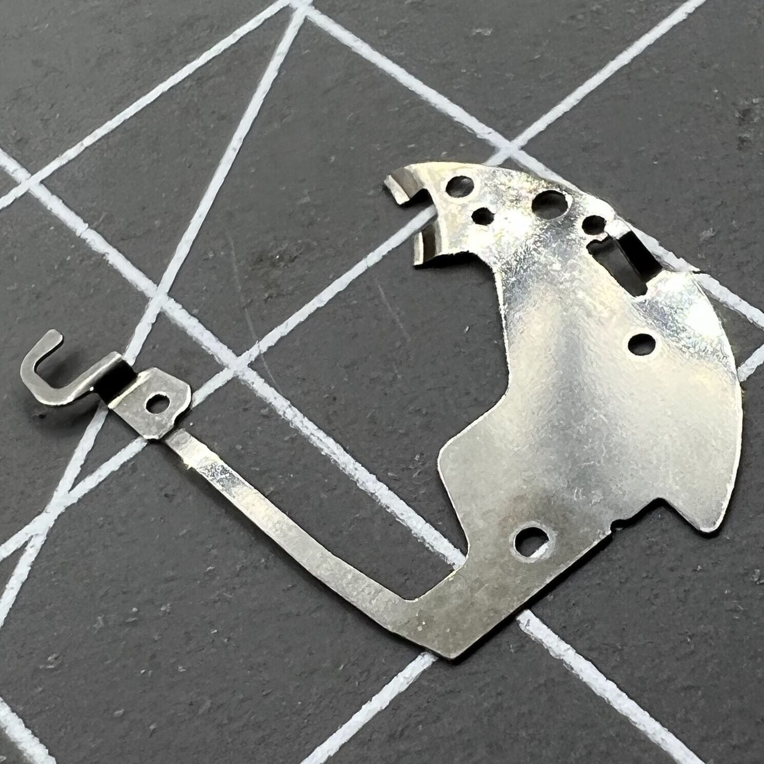 Circuit board jumper for Ronda 705/715/515/505 watch movement, precise fit, durable quality.
