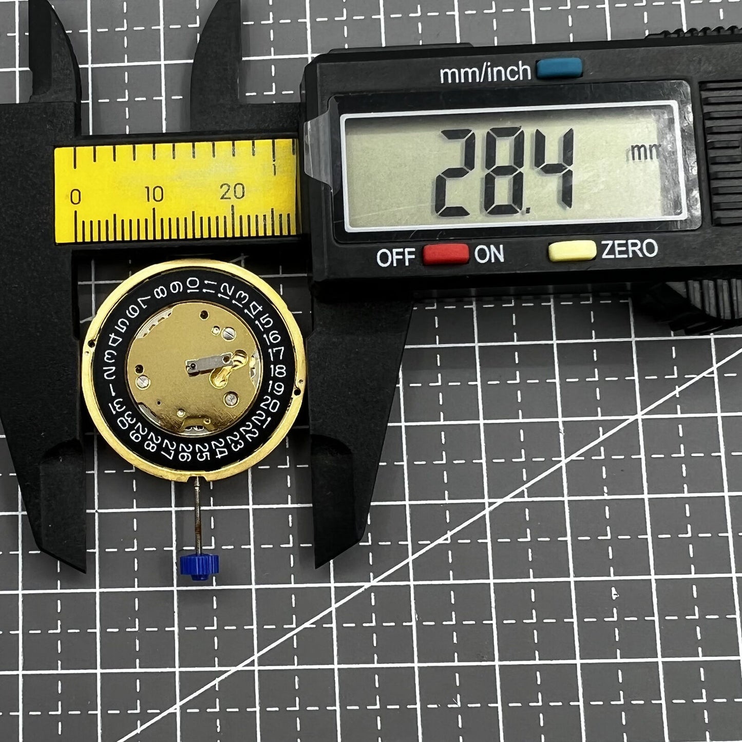 Swiss Made Ronda 5030D quartz watch movement with black date disk at 4 o'clock for precise watch repair.