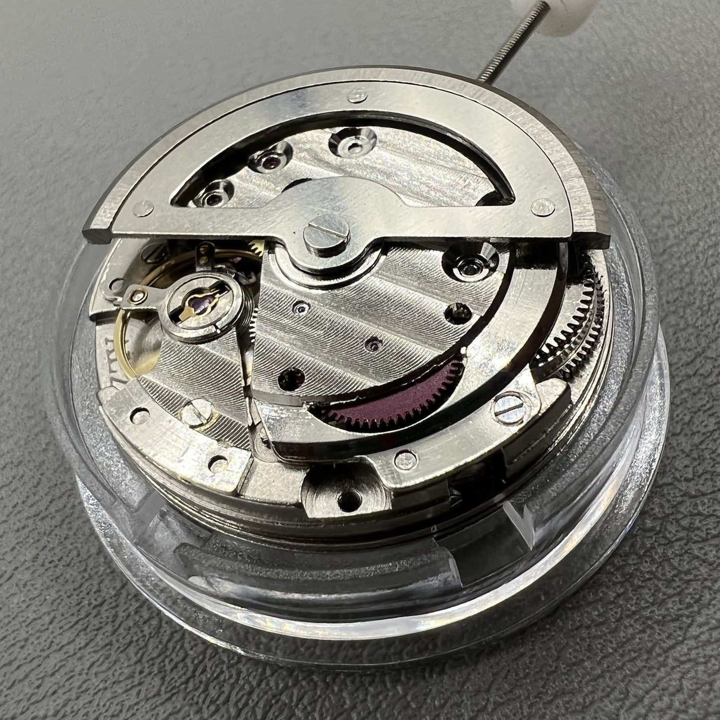China Made 8205 automatic mechanical watch movement with small seconds at 3, 6, and 9 o'clock positions.
