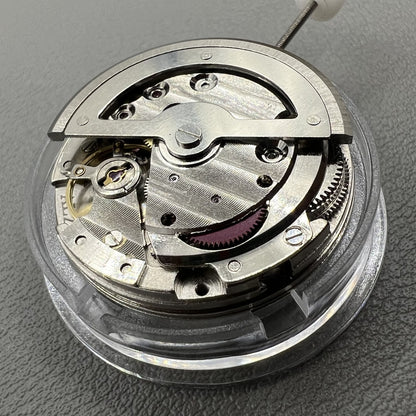 China Made 8205 automatic mechanical watch movement with small seconds at 3, 6, and 9 o'clock positions.