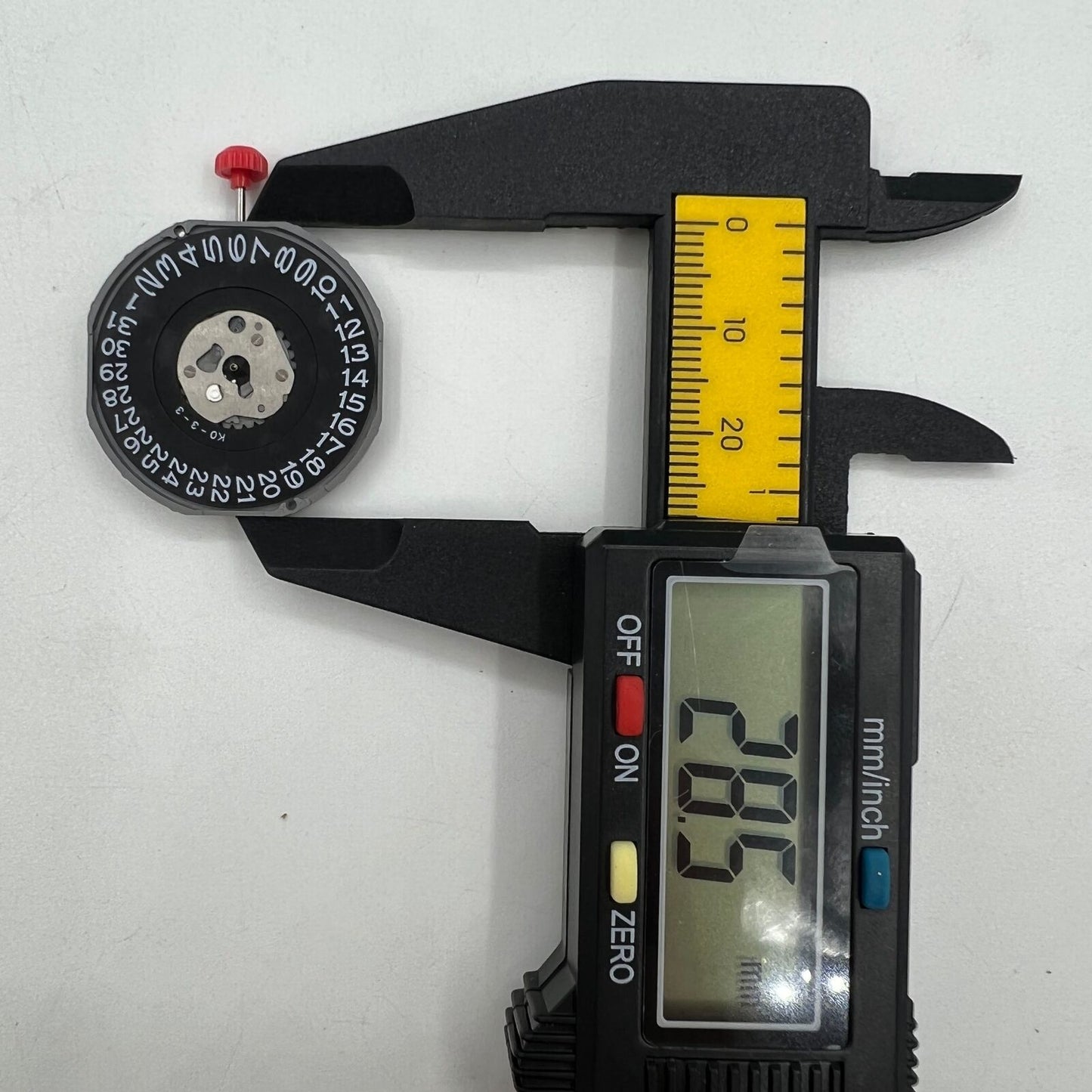 Miyota 2415 quartz movement watch accessory with black date disk at 3 o?clock, Japan-made precision part.