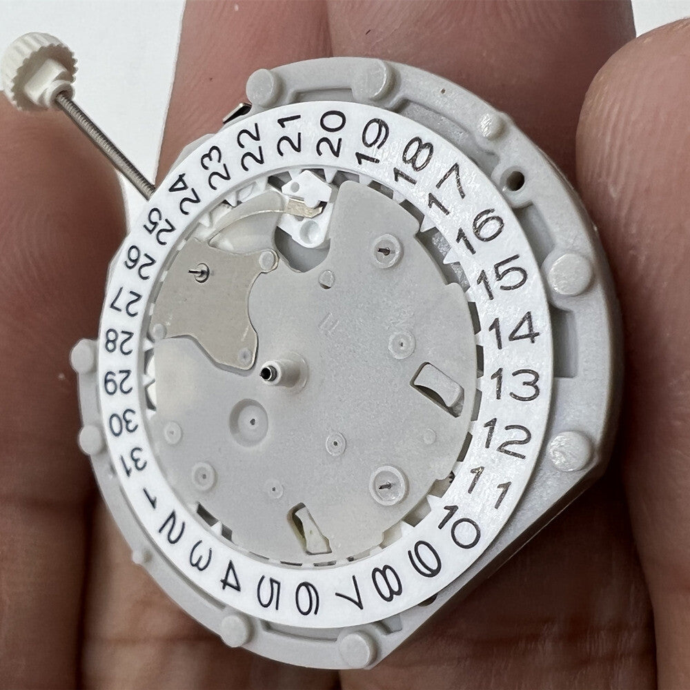 Sunon PE70 quartz watch movement with 3 hands, 3 sub-dials, and date display at 3 o'clock.