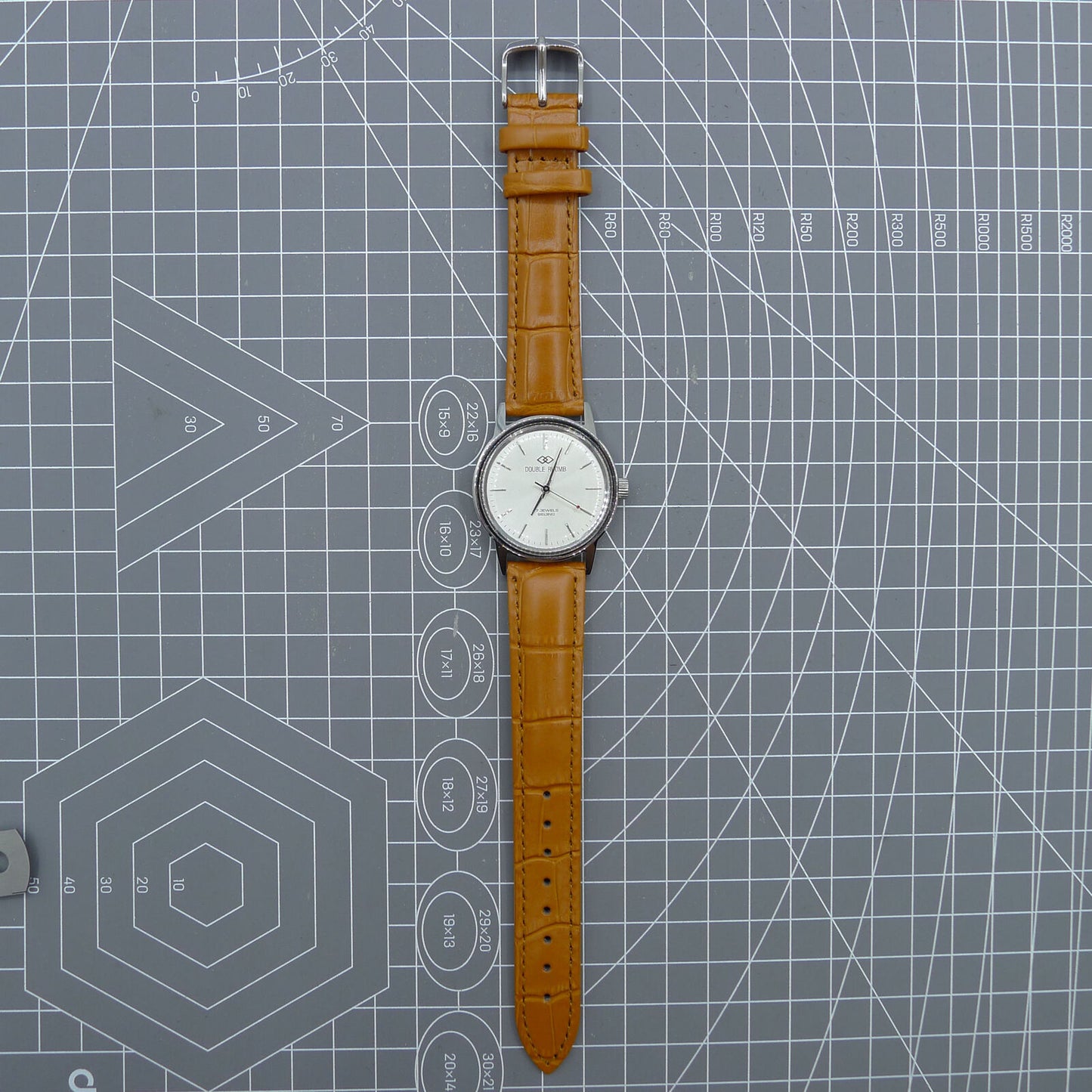 Beijing 36mm Double Rhomb watch with silver case and silver nail strap, manual mechanical movement for precise timekeeping
