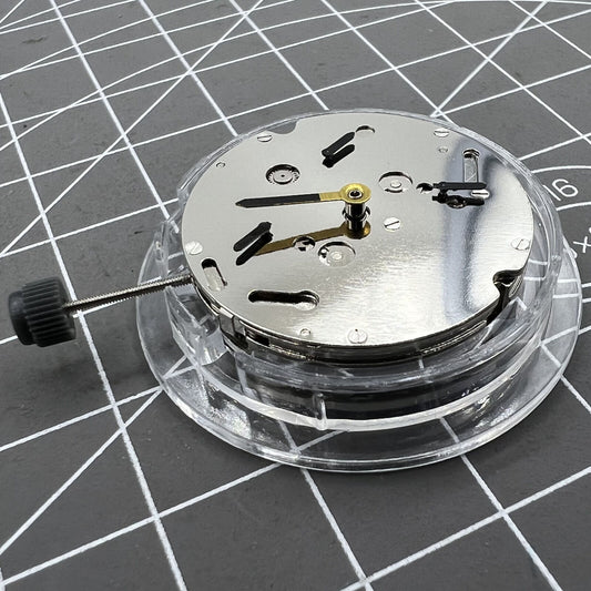 1. NN 8205 automatic watch movement showcasing intricate mechanical design.  