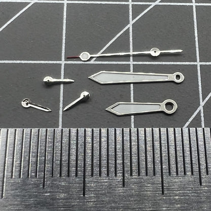 Arrow-shaped 13mm watch hands with silver trim and green lume for VD53 VD54 VD57 movements.