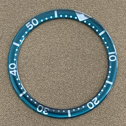 White font 39mm aluminum bezel insert with circular arc bevel for watch customization.