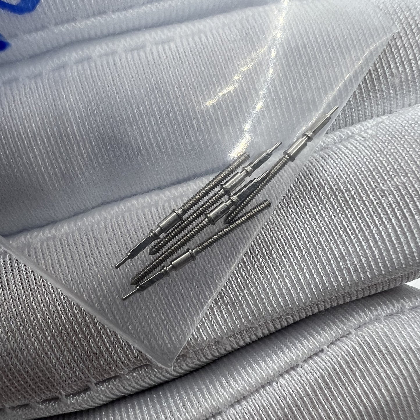 Chongqin watch stem for PT5000 movement, precise replacement part for watch repair.