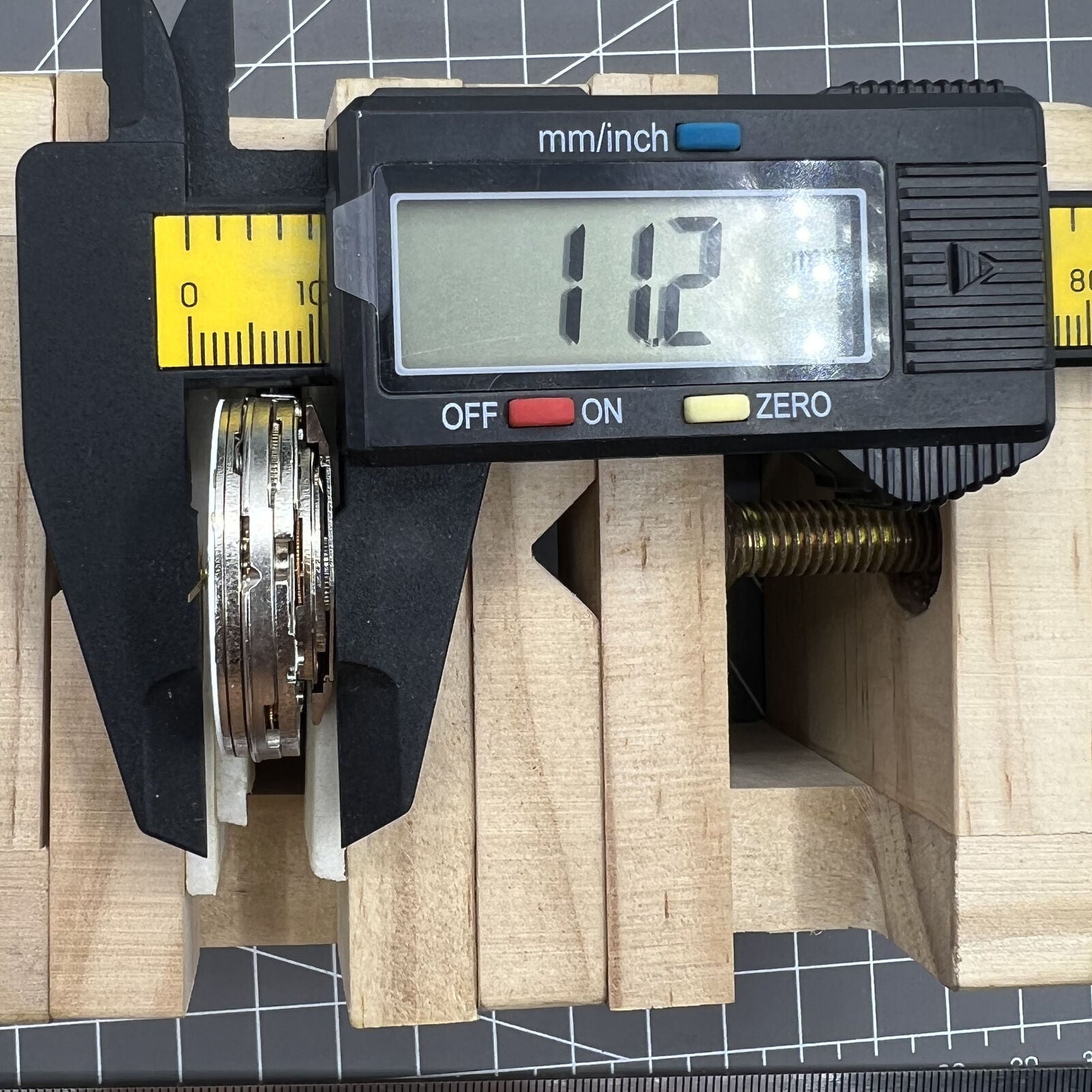 Automatic chronograph watch with ETA 7750, black dial, calendar at 4:30, and precision timing.