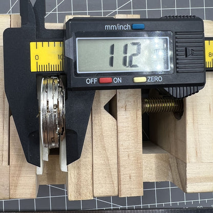 Automatic chronograph watch with ETA 7750, black dial, calendar at 4:30, and precision timing.