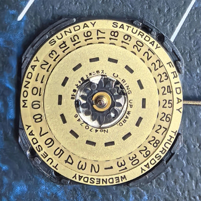 Original YL44A quartz watch movement with double calendar and three hands for accurate timekeeping.