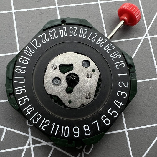 Black dial watch with Miyota 2315 quartz movement, 3 hands, date at 6, featuring watch stem.