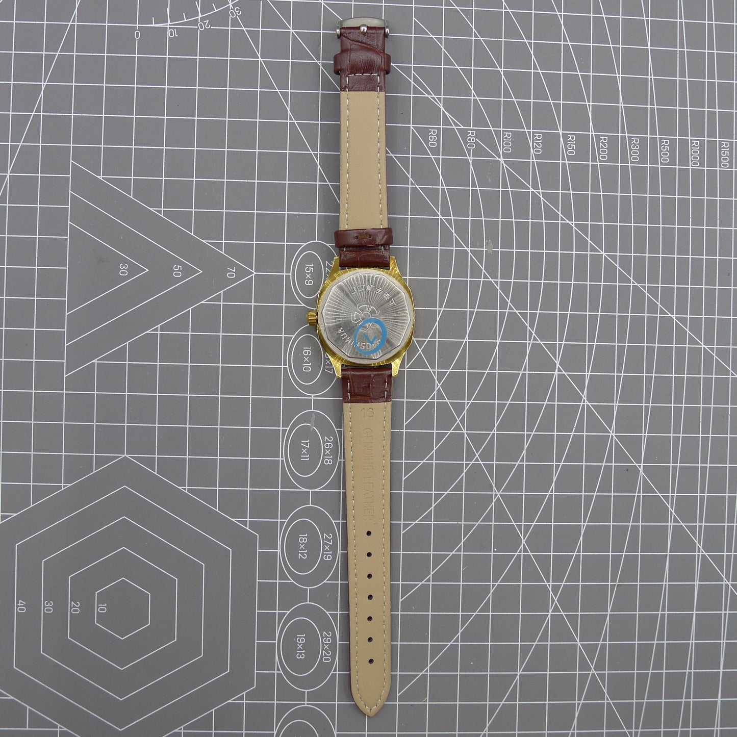 Shanghai 33mm manual mechanical watch with blue dial, golden nail markers, square case, 17 jewels movement.