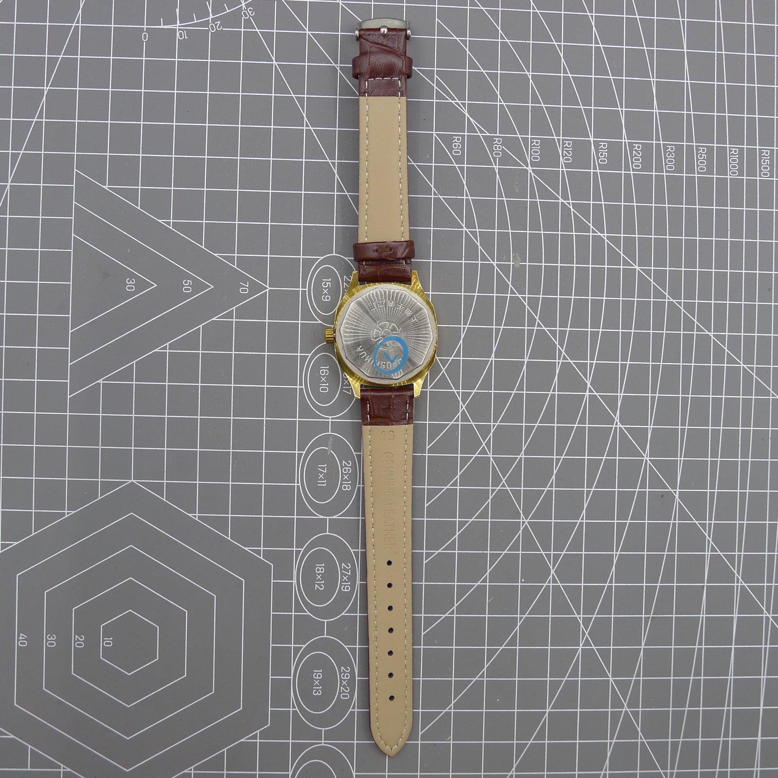 Shanghai 33mm manual mechanical watch with blue dial, golden nail markers, square case, 17 jewels movement.