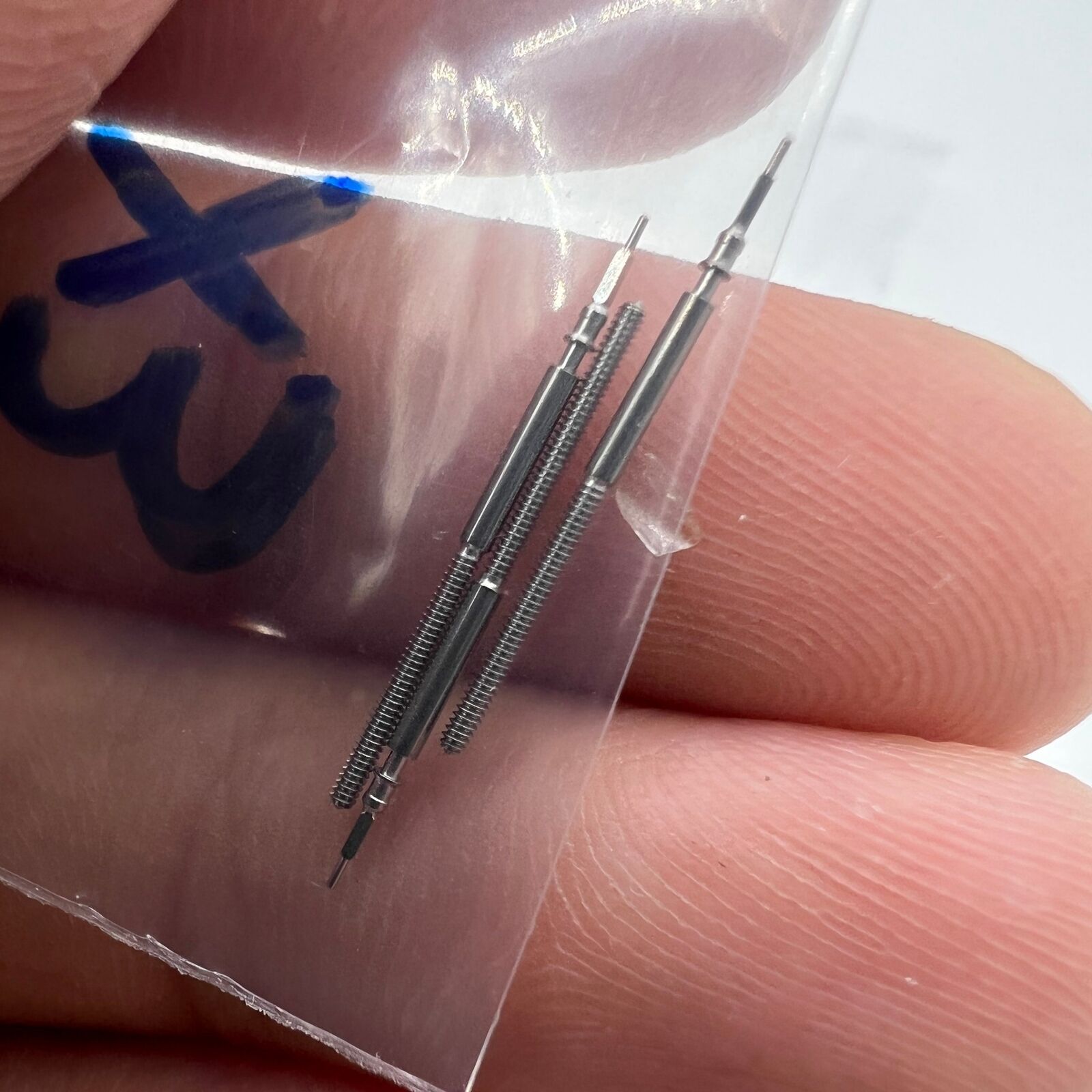 Precision winding stem for Miyota 0S series watch movements, durable replacement accessory.