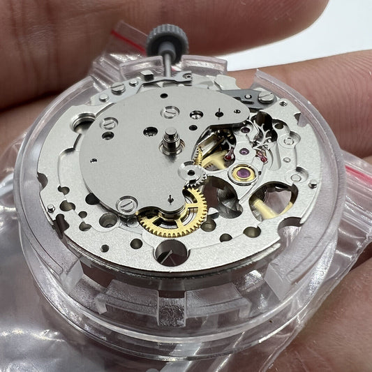 Miyota Citizen 82S7 silver plated automatic mechanical watch movement from Japan, precise timekeeping components.