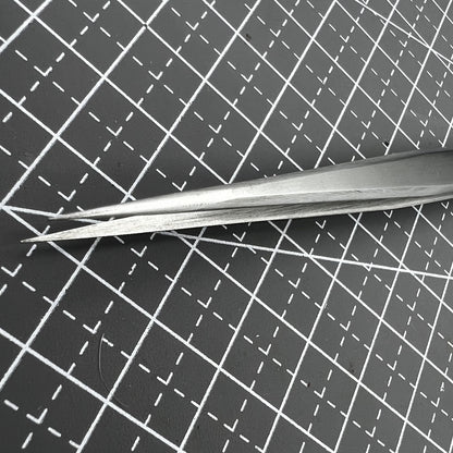 ST11 Superhard Antimagnetic Tweezer by Edelstahl, precision tool for watch repair and delicate accessory handling.