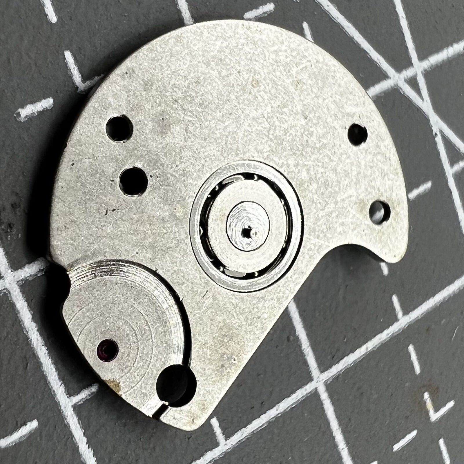 Seagull ST16 automatic wheel bridge component for precise watch movement assembly and repair.