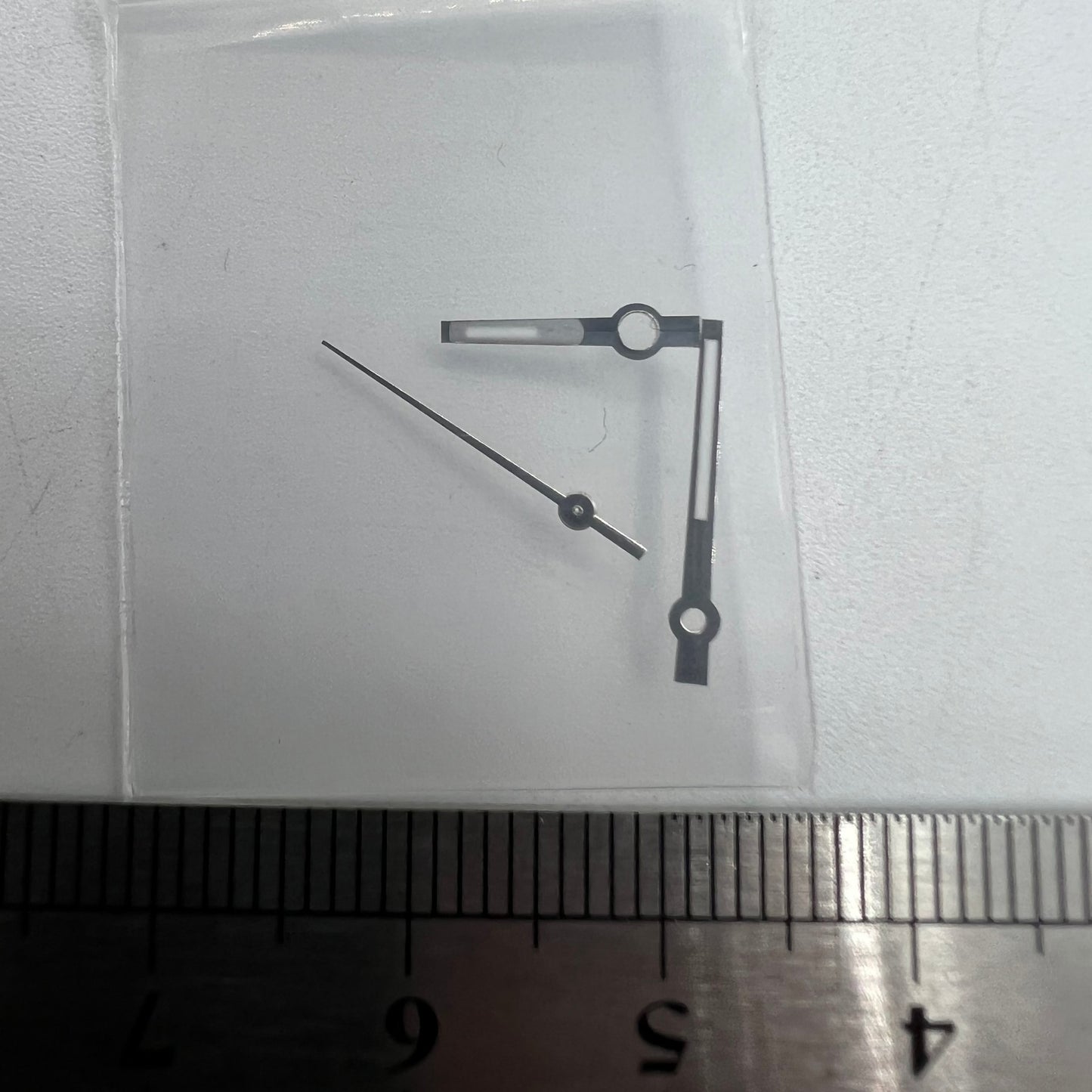 Silver trim green luminous watch hands for NH35/NH36/4R/7S movements, perfect for clear time reading and stylish upgrades.