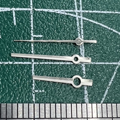 Long silver watch hands with black trim, no lume, compatible with NH35/NH36/4R/7S movements for precise timekeeping.