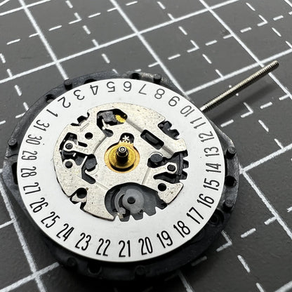 Hattori Epson VX19E quartz movement with date display at 6 o'clock for precise watch accessory repair.