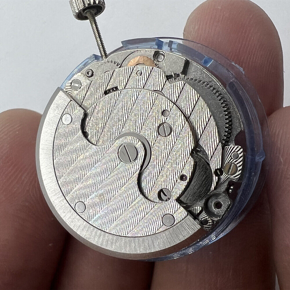 Asian Tianjin Seagull T17 watch with automatic movement and single calendar, stainless steel sleek design.