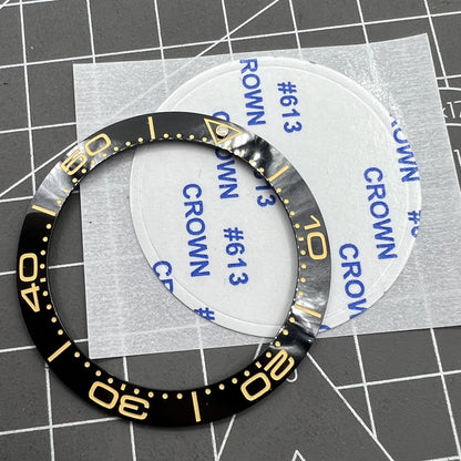 Black ceramic watch bezel insert with yellow font, 41.5mm/32.5mm size for stylish accessory upgrades.