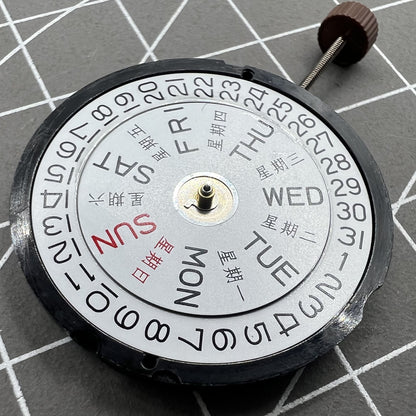 Ronda 517 quartz watch movement with day and date display at 3 o'clock position, suitable for watch accessories.