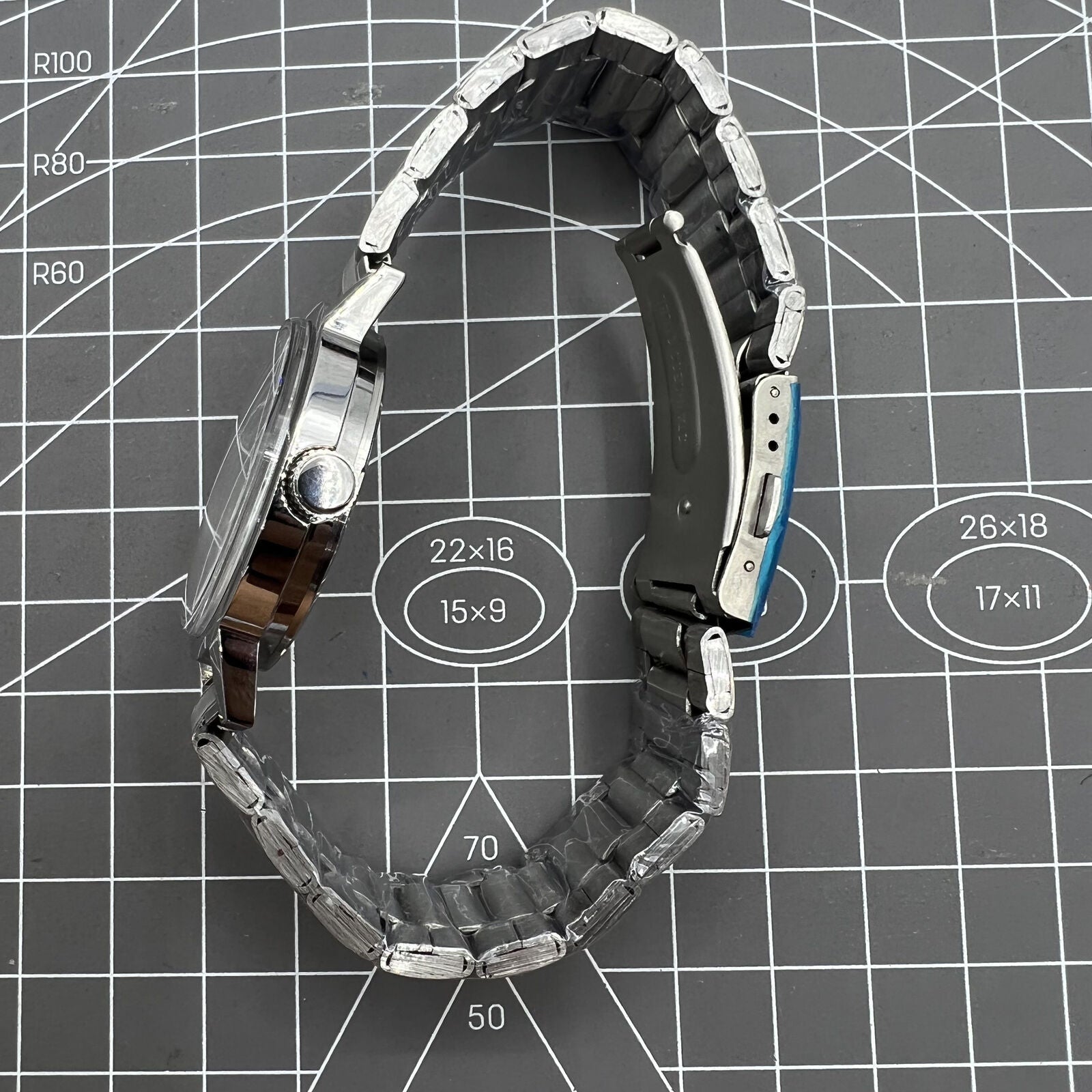 China Baihua 37mm manual mechanical watch with silver dial, 19 jewels, and shock-resistant design for durability.