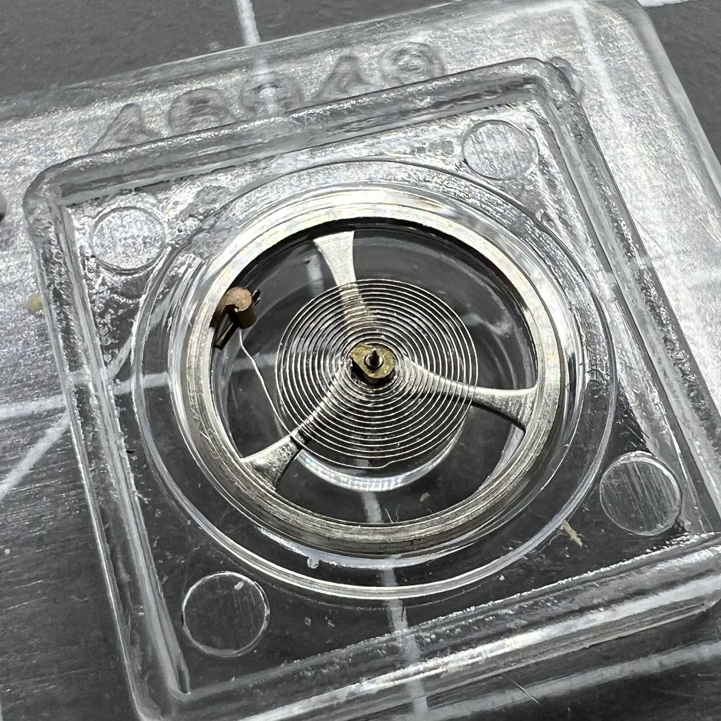 Balance wheel with hairspring for Movement 7009 Asian watch, precision fit for smooth timekeeping.