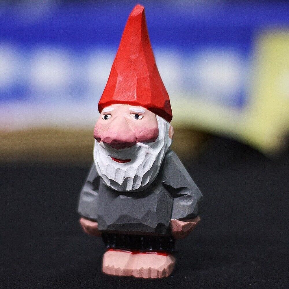 Handcrafted wooden dwarf garden elf sculpture, perfect for whimsical outdoor decor.