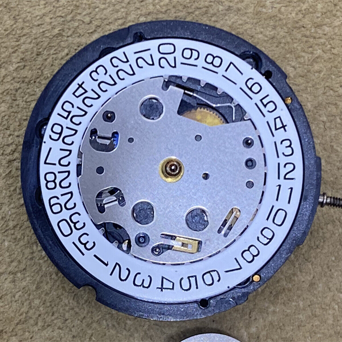 ETA G15.211 quartz watch with 3 hands, date display, Swiss movement precision by ETA.