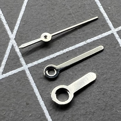 Silver watch hands set by Miyota for 2035, 2115, 2105, 2305 movements, precise and stylish replacement.