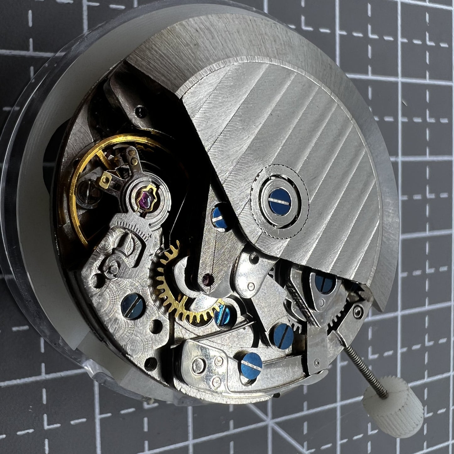 China 7750 automatic chronograph watch movement by ETA with single calendar, precise mechanical components.