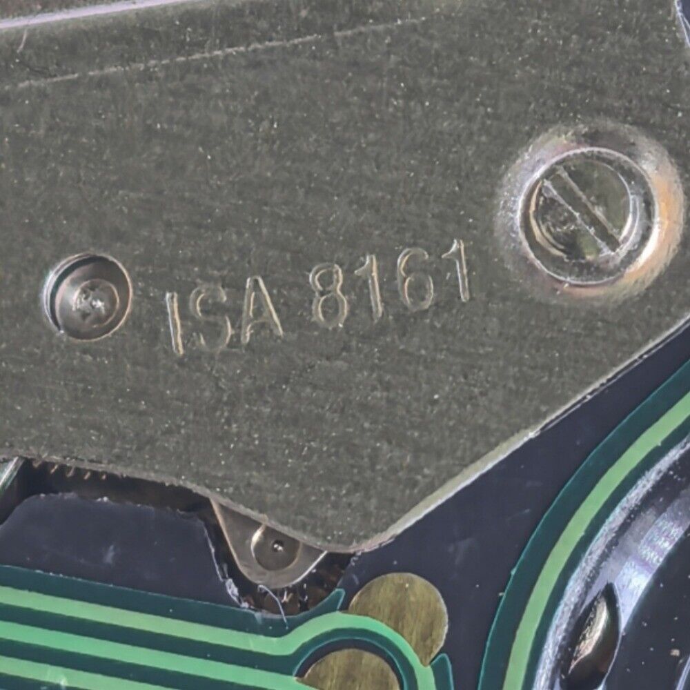 Swiss Made ISA 8161 watch with silver case, date display at 4, and six multifunctional hands for accurate timekeeping