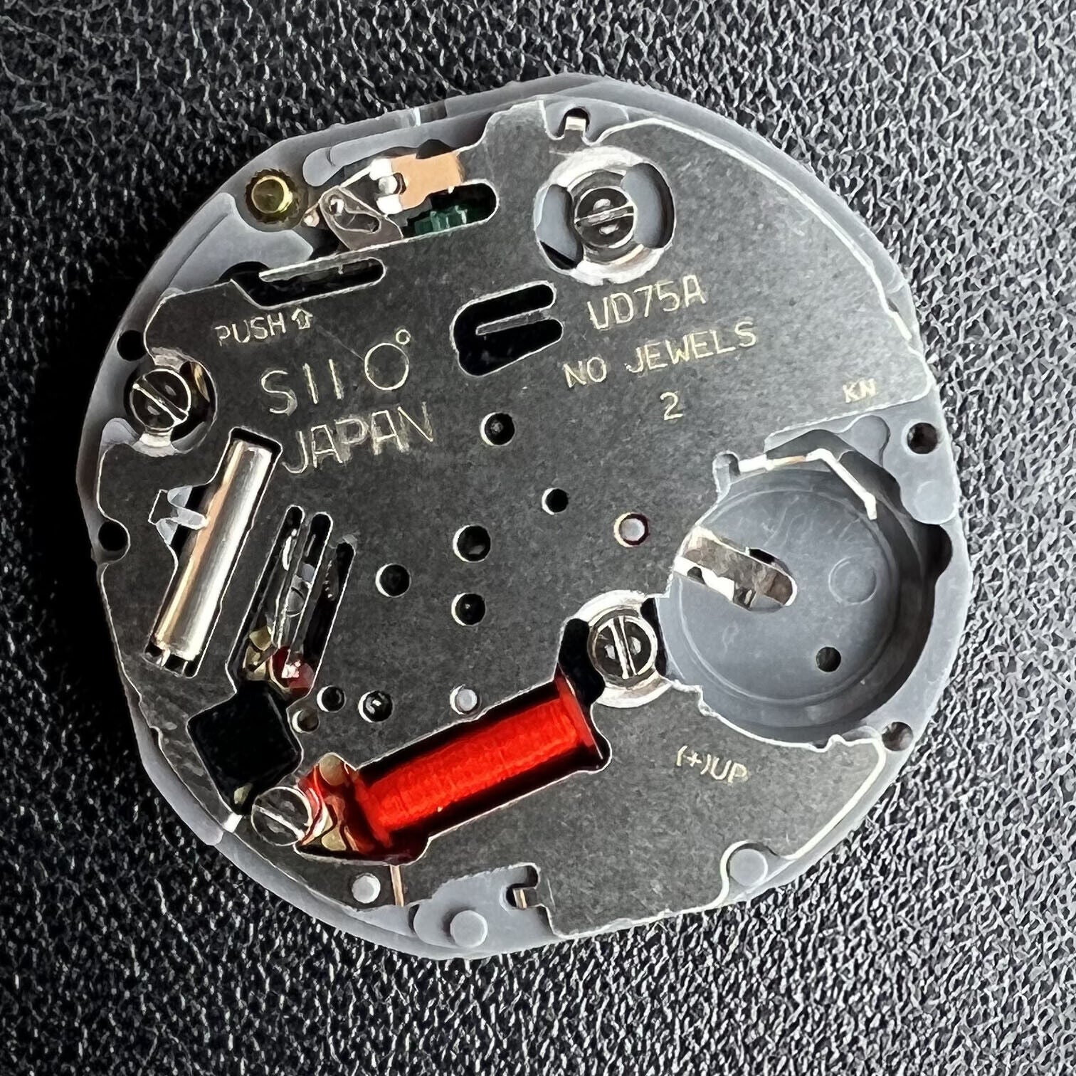 Hattori Epson TMI VD75 quartz watch movement, Japan-made, for precise watch accessory repairs.
