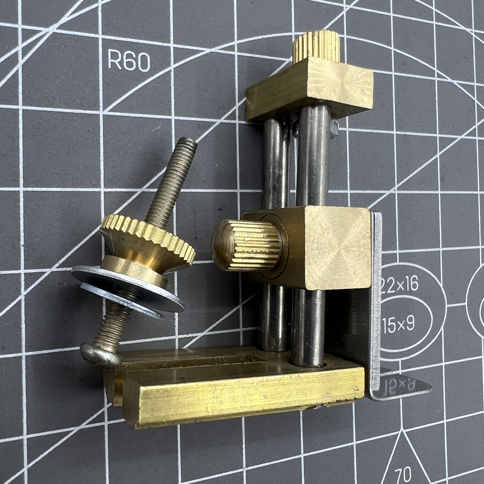 Auxiliary positioning tool for precise watch stem cutting with cutter plier accessory.